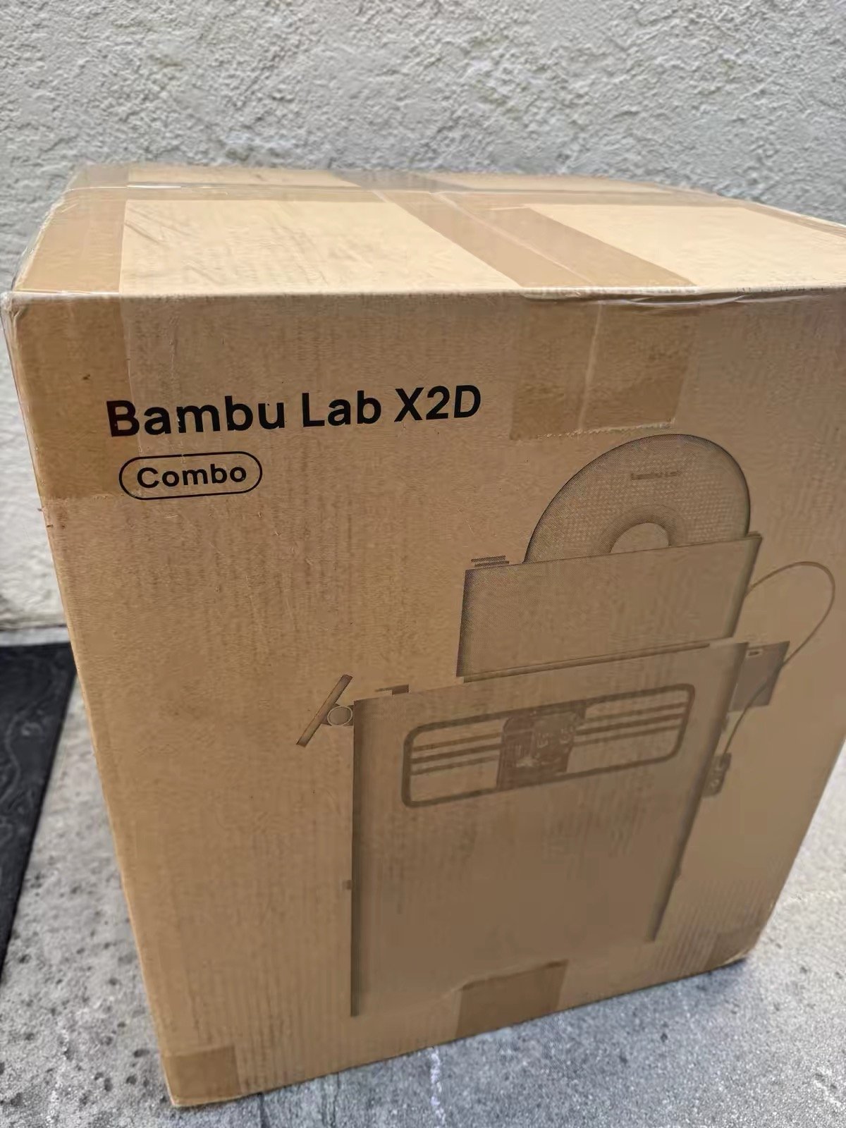 Bambu Lab X2D vs Creality K2 Pro: Which One Should You Buy? (2026) 2 Bambu Lab X2D Combo retail shipping box