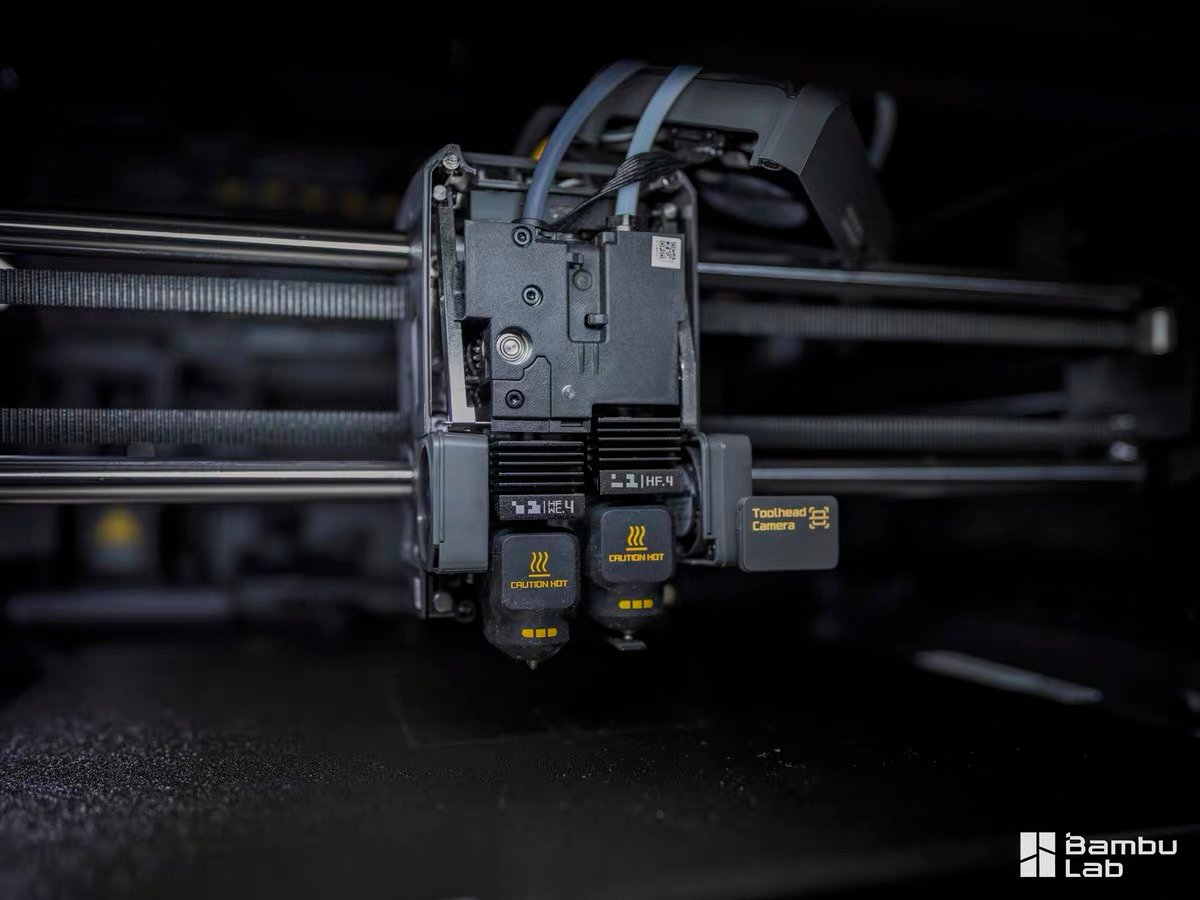 Bambu Lab X2D dual nozzle WE.4 and HF.4 close-up with Toolhead Camera