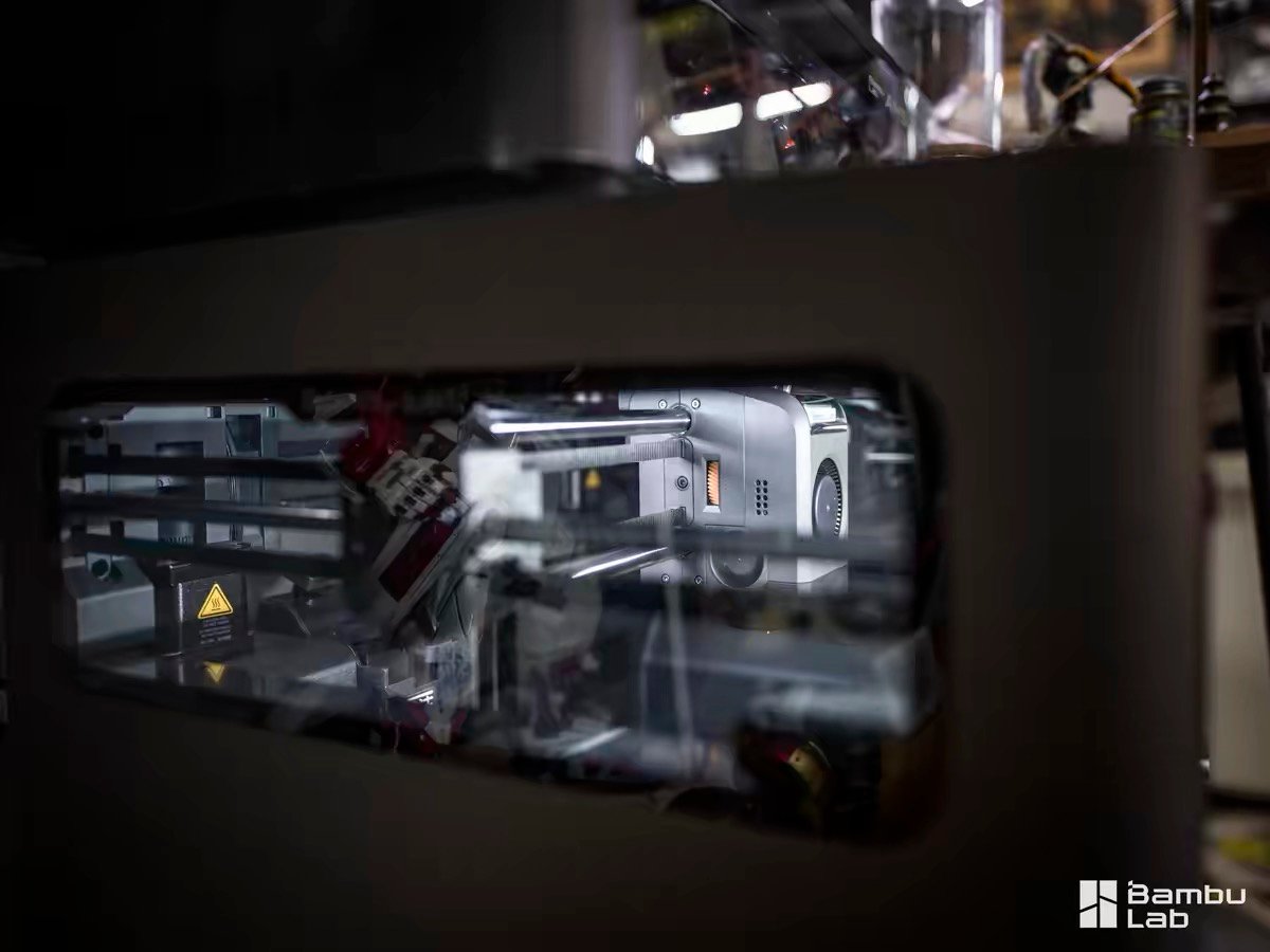 Bambu Lab X2D vs Snapmaker U1 (2026): Dual Nozzle vs Tool Changer — Which Should You Buy? 5 Bambu Lab X2D interior components viewed through frame opening