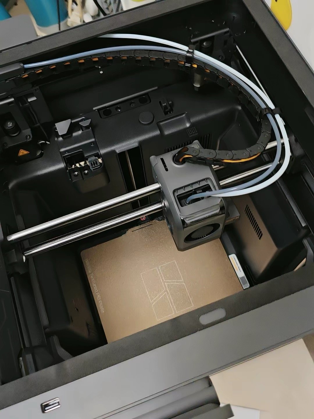 Bambu Lab X2D print chamber top-down view with textured PEI magnetic plate