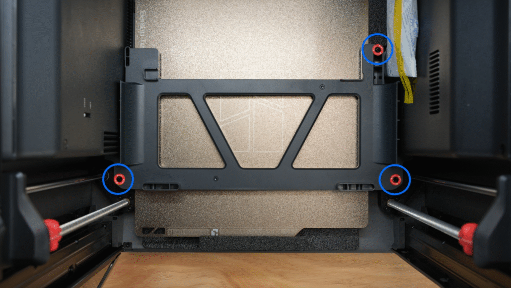 red transport screws location — show all 3 under heatbed