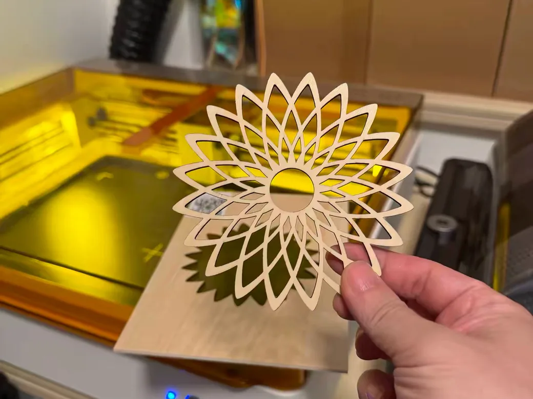 The Best Laser Engravers in 2026 (Tested, Honest, By Type) 5 Intricate flower mandala cut from thin plywood with a laser