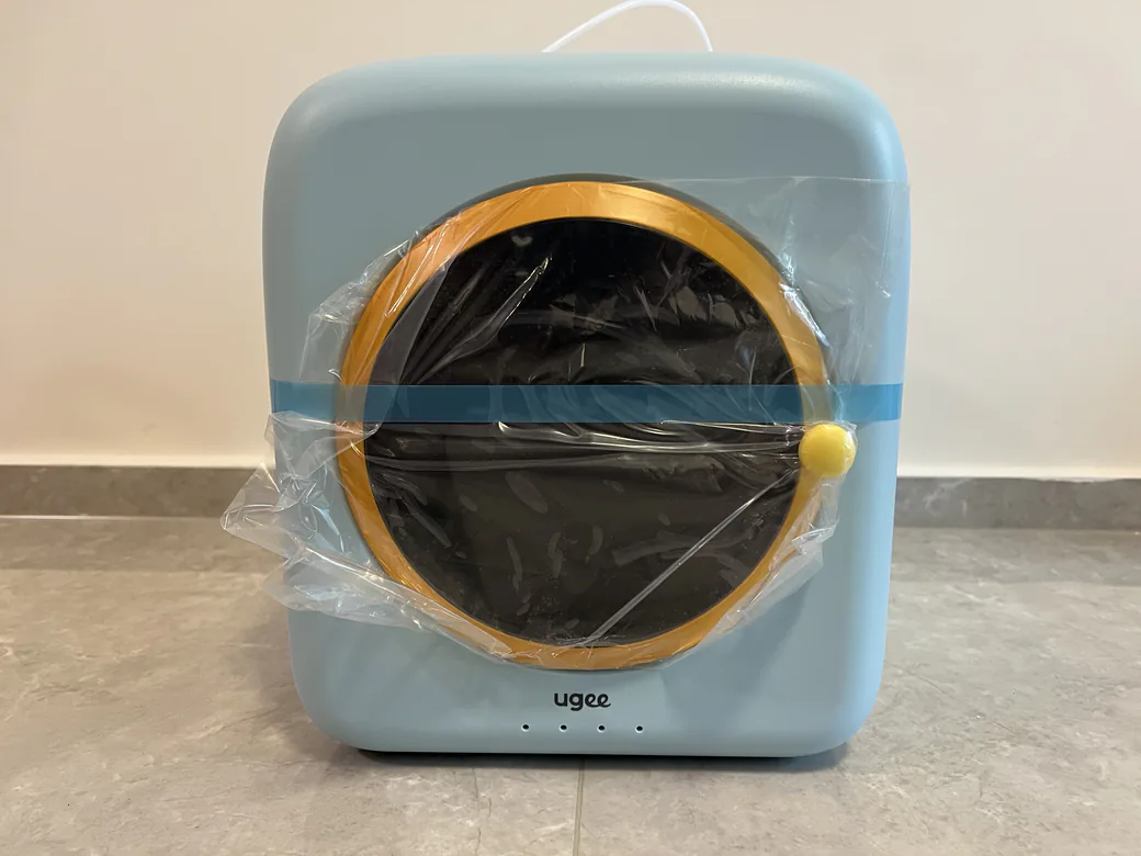Is 3D Printing Safe for Kids? A Parent's Honest Guide (2026) 2 An enclosed FDM 3D printer with a closed door acting as a barrier around hot parts