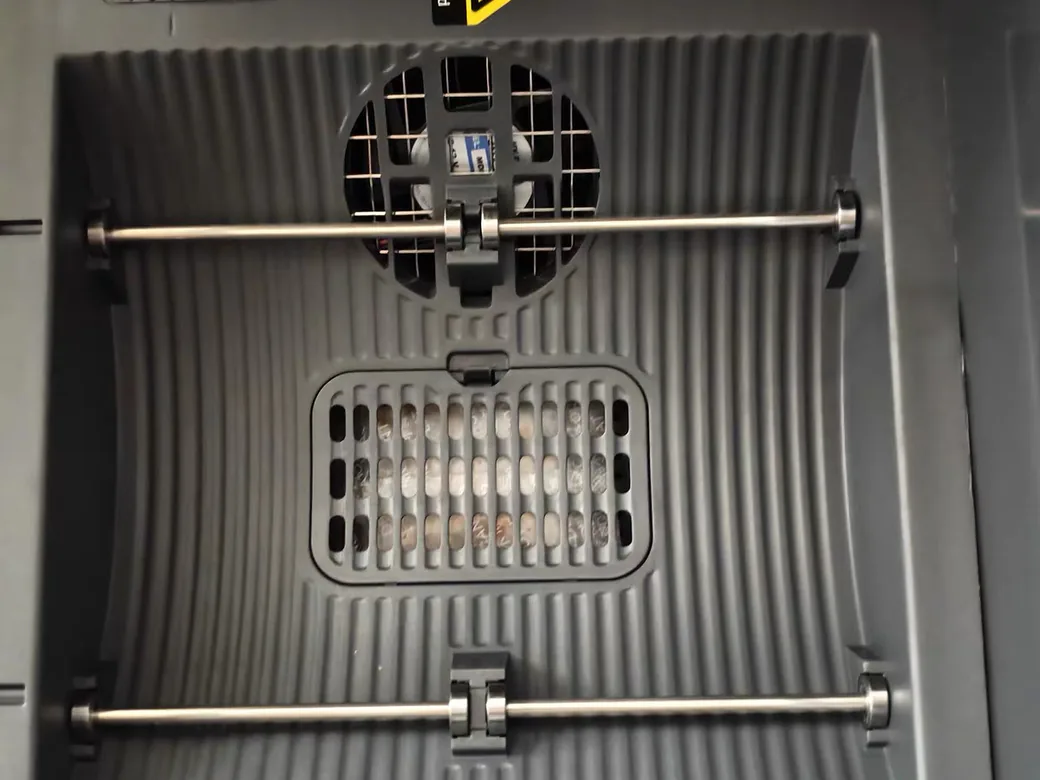 SUNLU S4 Filament Dryer Review: A 4-Spool Workhorse With One Rule You Can't Ignore 4 Inside the SUNLU S4 filament dryer: circulation fan, steel spool rollers and the desiccant tray