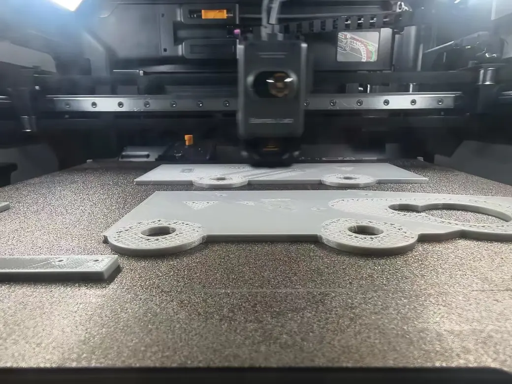 Best Slicer for 3D Printing in 2026: The Honest Pick by Printer, Not Hype 3 Bambu Lab printer running an FDM print inside the chamber