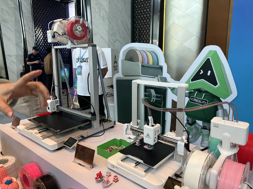 Best Slicer for 3D Printing in 2026: The Honest Pick by Printer, Not Hype 5 Creality Ender style FDM printers displayed on a trade show table