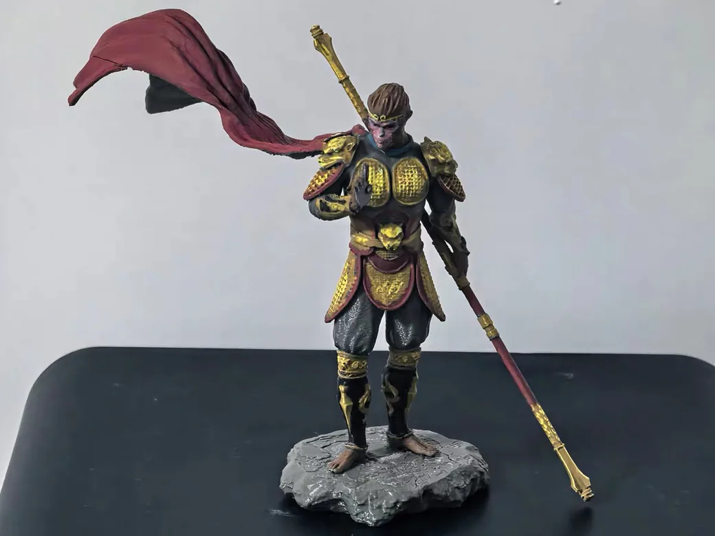 How to Change Layer Height at a Specific Z in Cura (And What to Do Instead) 6 Hand-painted 3D printed warrior figure with fine surface detail on a black desk