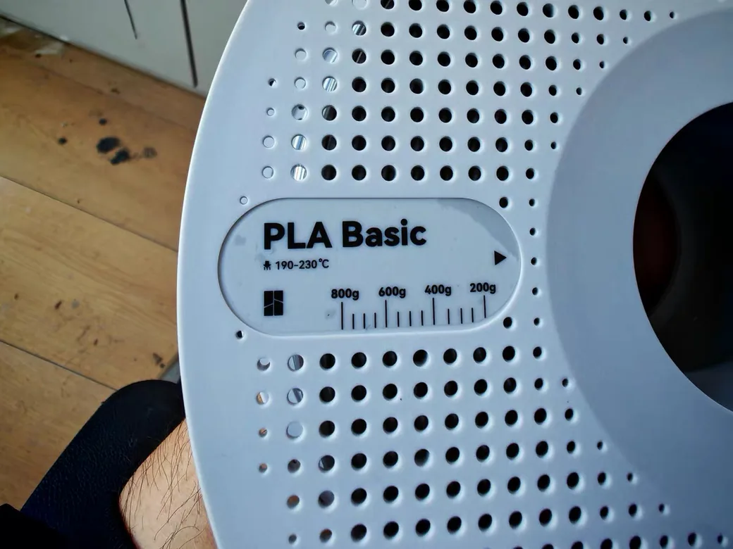 Filament Storage Ideas: 6 Setups Ranked by Cost, Capacity, and What They Don't Fix 11 Close-up of a filament spool label showing material type, print temperature range and a remaining-weight scale