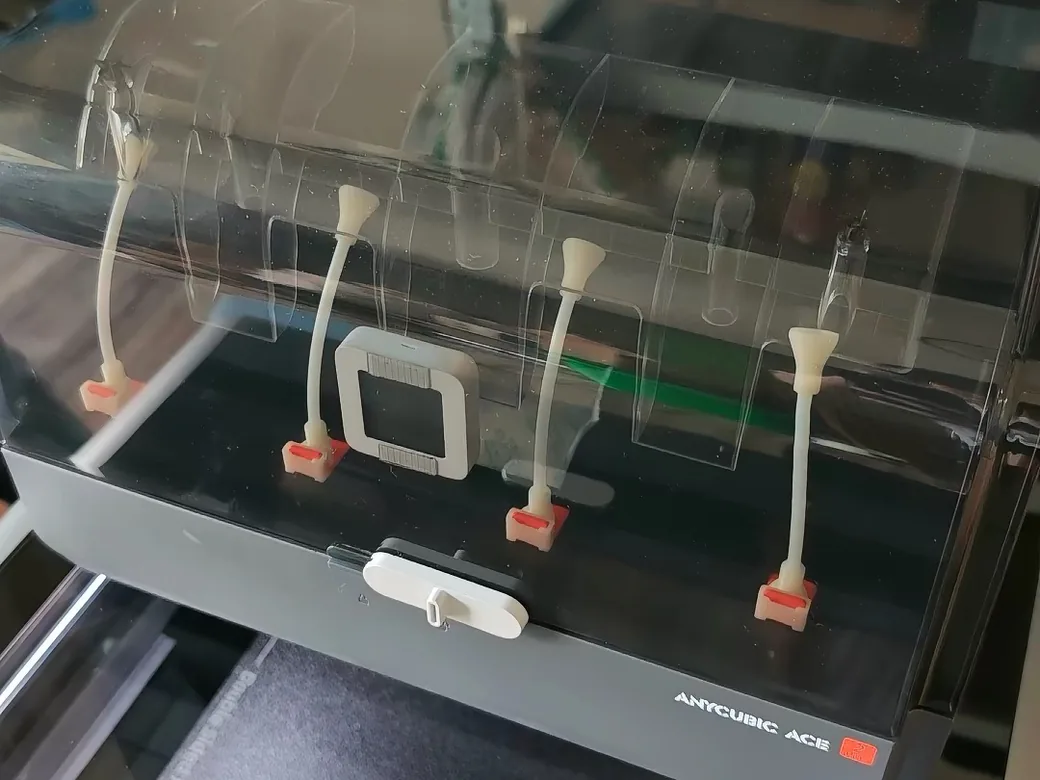 The Best Anycubic Kobra S1 Max Upgrades Worth Buying (2026) 10 Empty filament bays inside the Anycubic ACE Pro unit, showing the feed tubes that route material into the printer