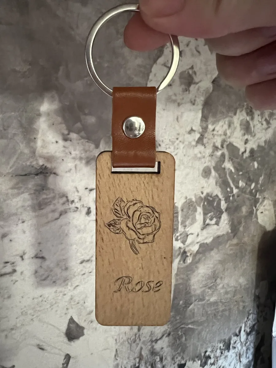 Carverall X1Pro (JL9) Review: Unboxing and Cutting Tests (2026) 21 Rose design engraved onto a wood and leather keychain blank with the Carverall X1Pro