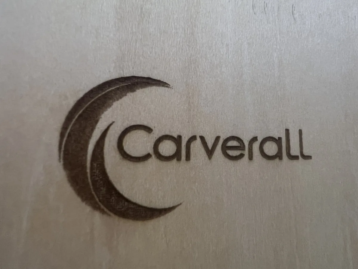 Carverall X1Pro (JL9) Review: Unboxing and Cutting Tests (2026) 25 The Carverall logo engraved on basswood as a test piece