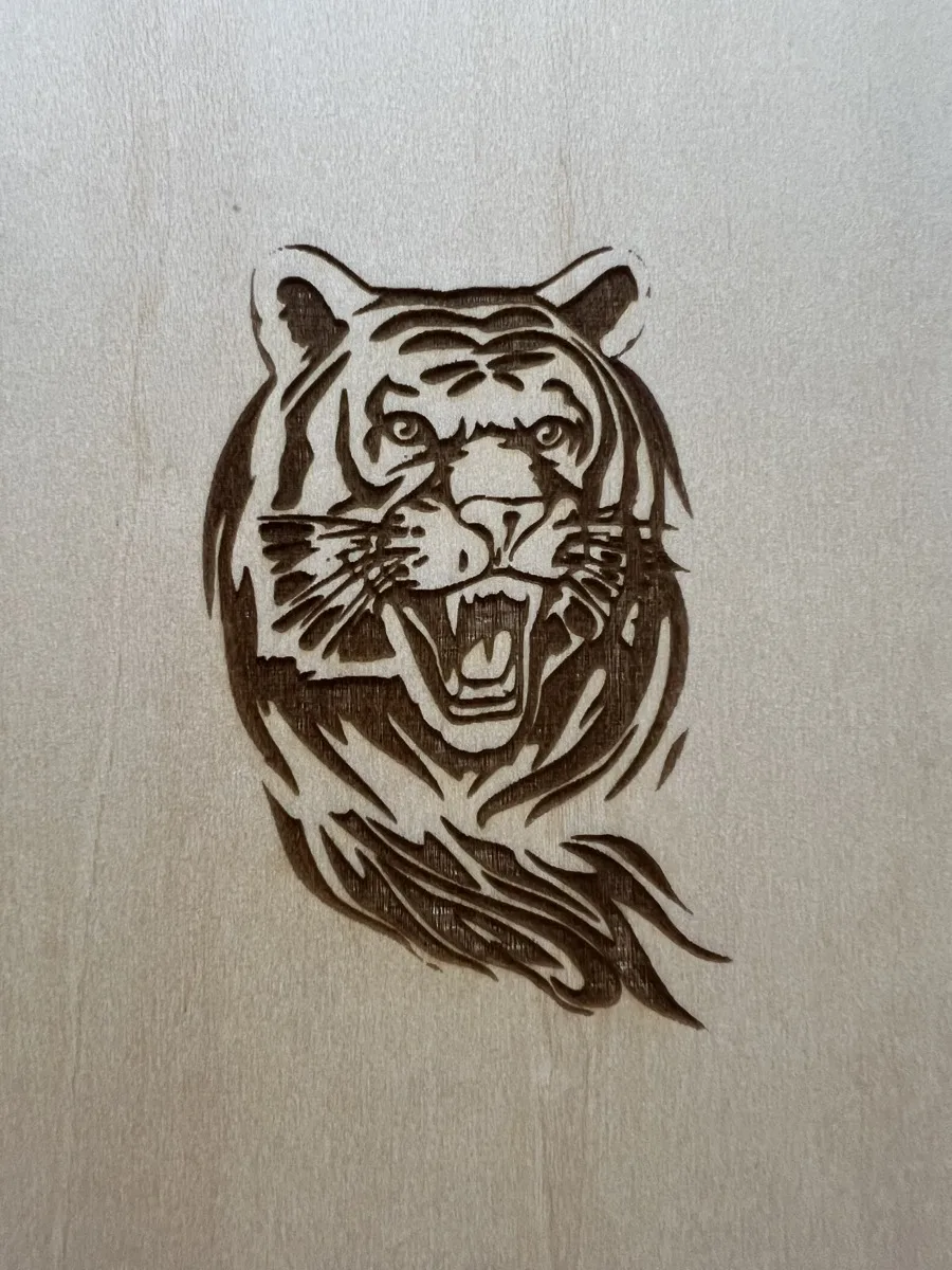 Carverall X1Pro (JL9) Review: Unboxing and Cutting Tests (2026) 20 Detailed tiger head engraving on basswood testing the Carverall X1Pro's fine-line detail