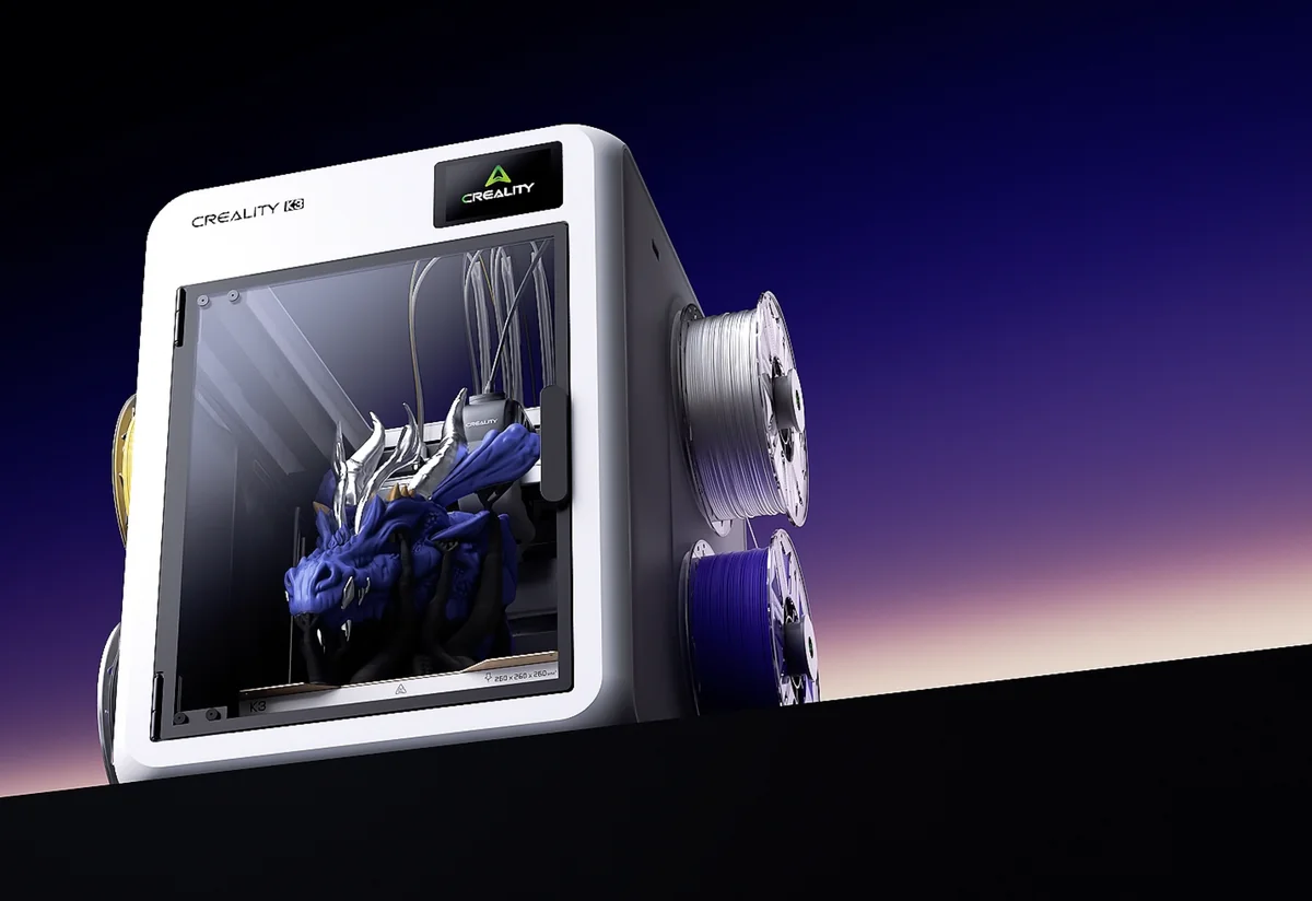 Creality K3 & KliTek: Specs, Release Date & Community Reaction (2026) 3 Creality K3 3D printer mid-print with a blue dragon model, four filament spools visible on the side