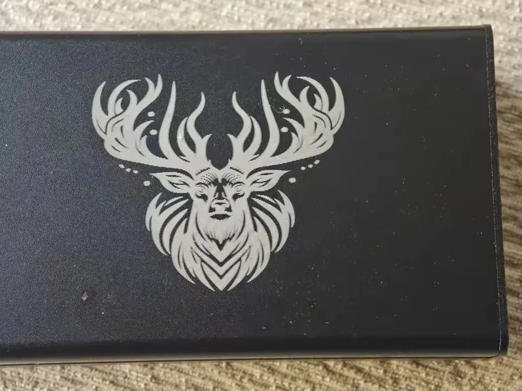 How to Get the BEST Laser Engraving Settings (A Repeatable Test Method) 3 Detailed stag design engraved on a dark metal card as an advanced laser settings example