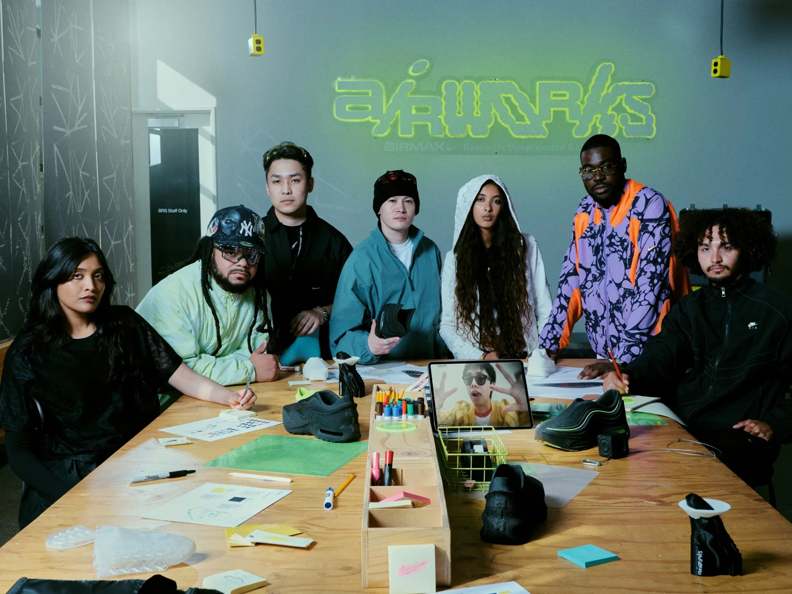 The first class of Nike Air Works designers at a work table with 3D-printed Air Max prototypes